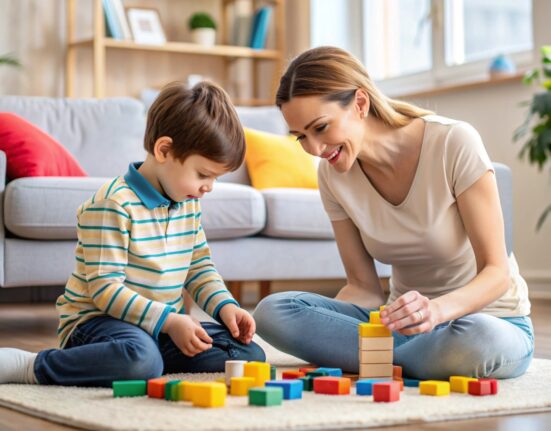 autistic child plays with his mother at home